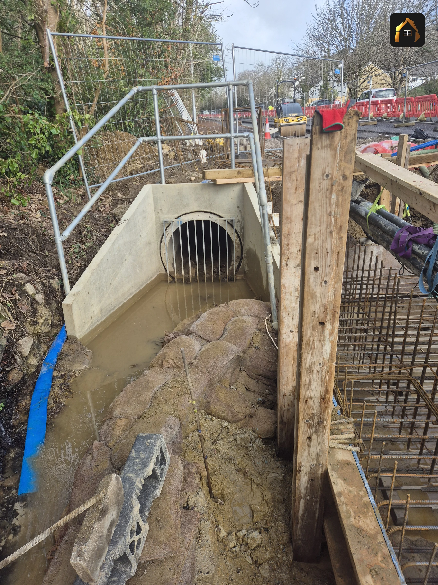 Precast culvert pipe and concrete headwall under construction on the A30 bypass in Penzance