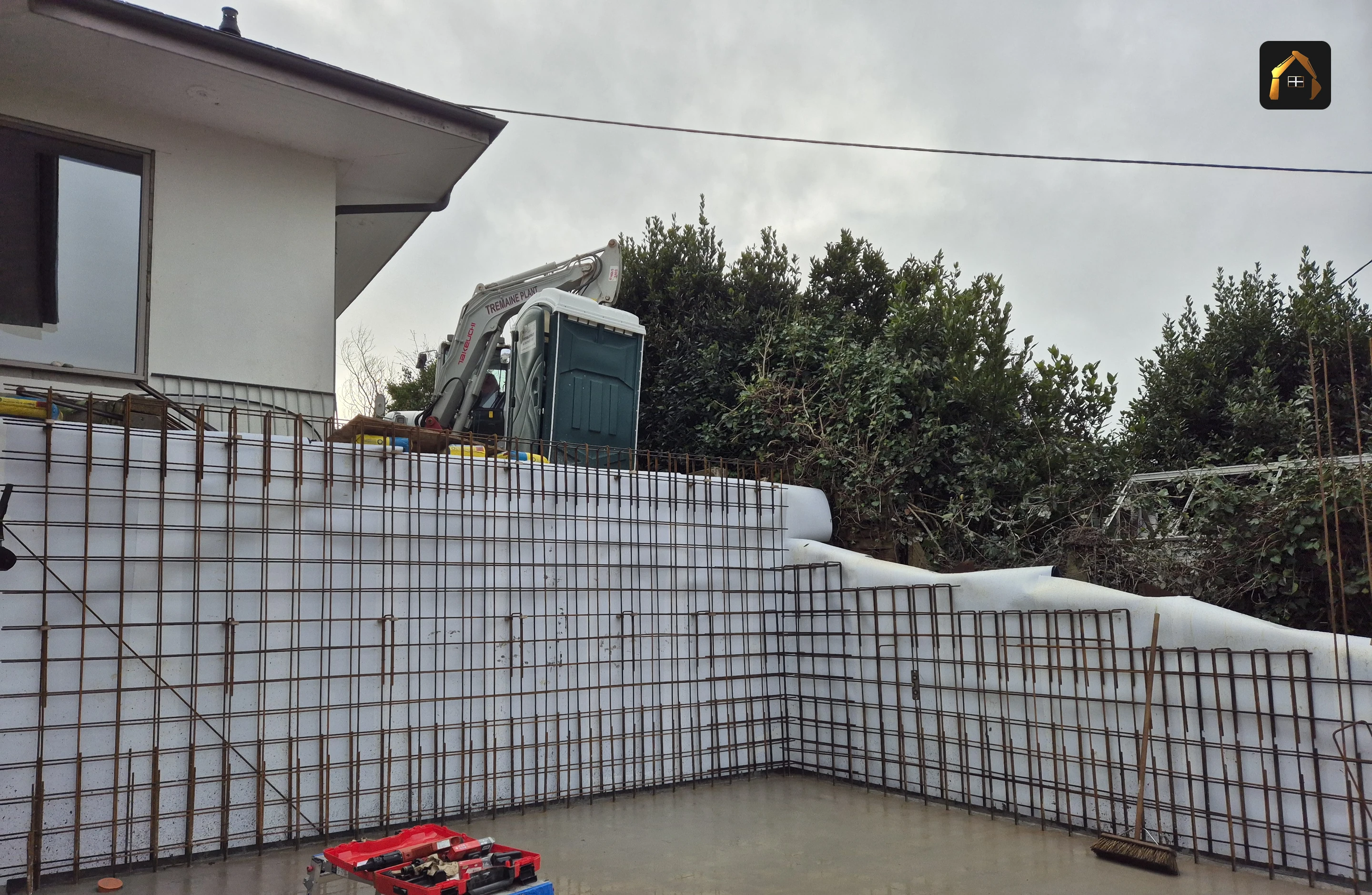 Steel reinforcement mesh laid across the slab before the pour in Helford