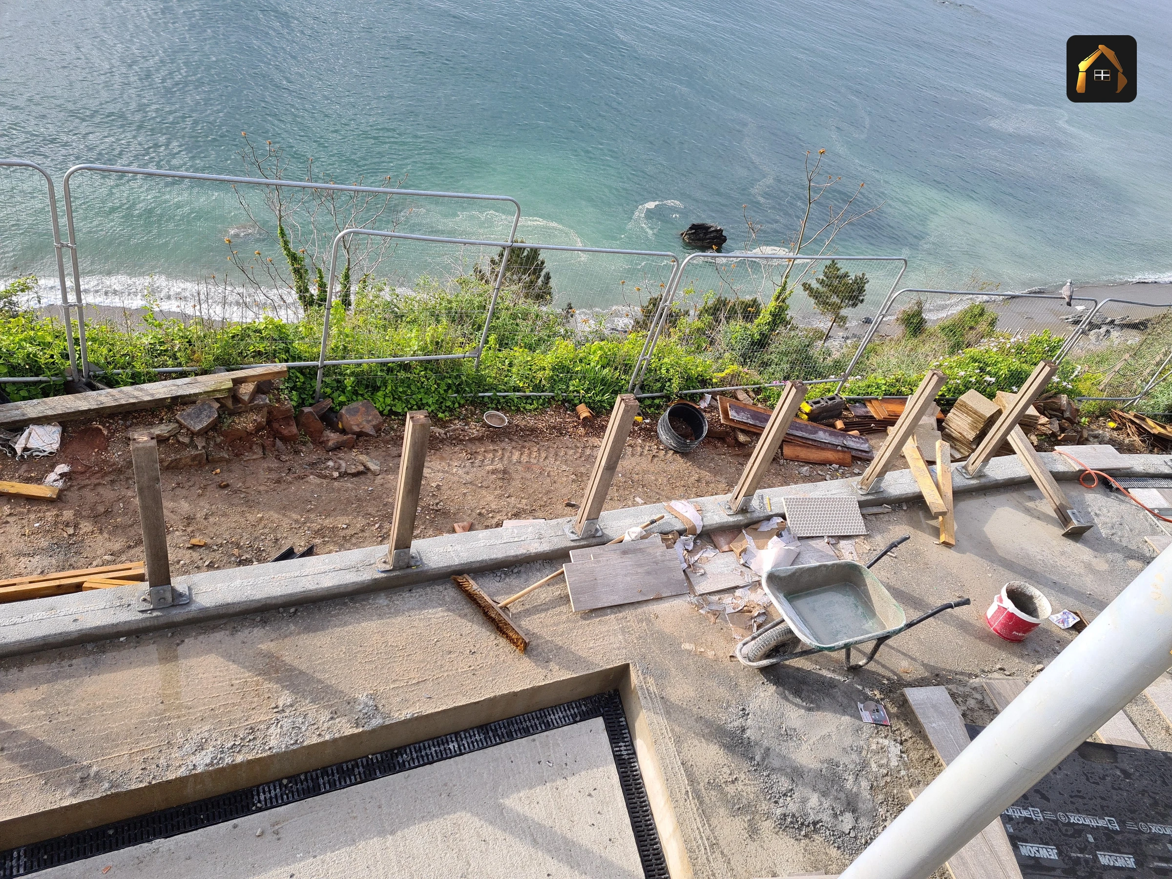 Terrace slab formwork being built above the cliff at a clifftop house in Looe