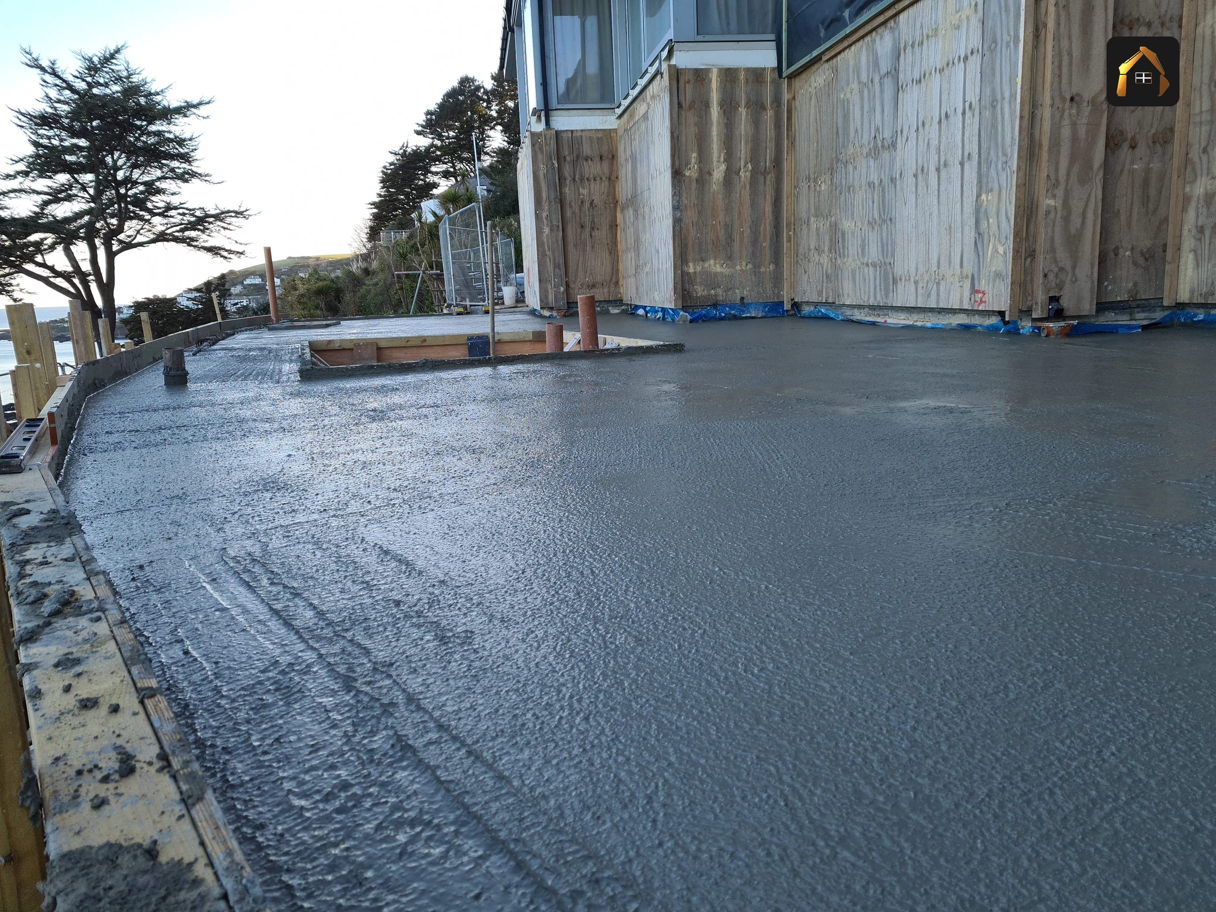 Completed large concrete slab with the sea on the horizon in Looe