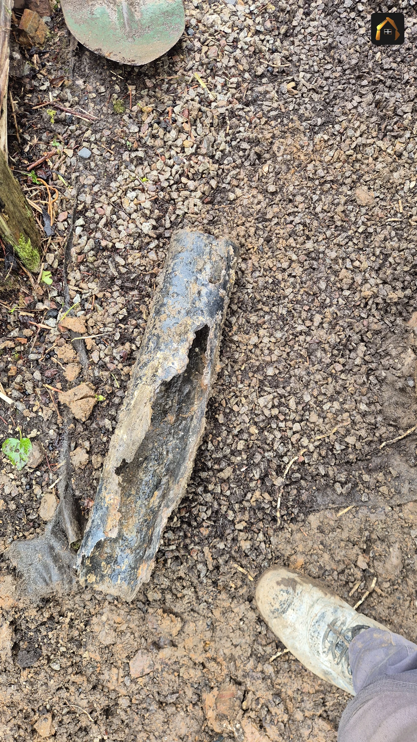 Before work: broken clay drain section lifted out in Ludgvan