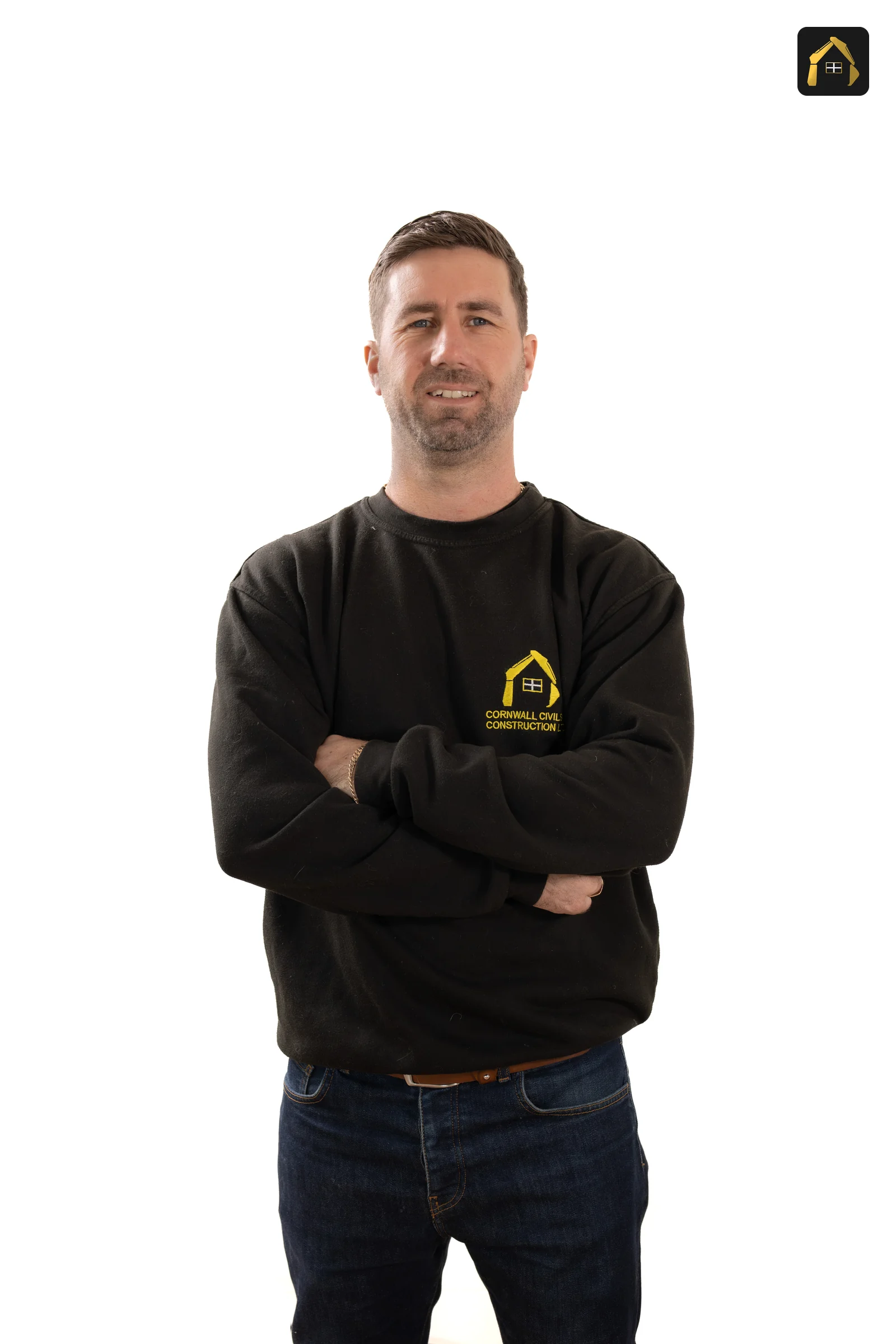 Matt Richards of Cornwall Civils & Construction in a branded sweatshirt, arms folded
