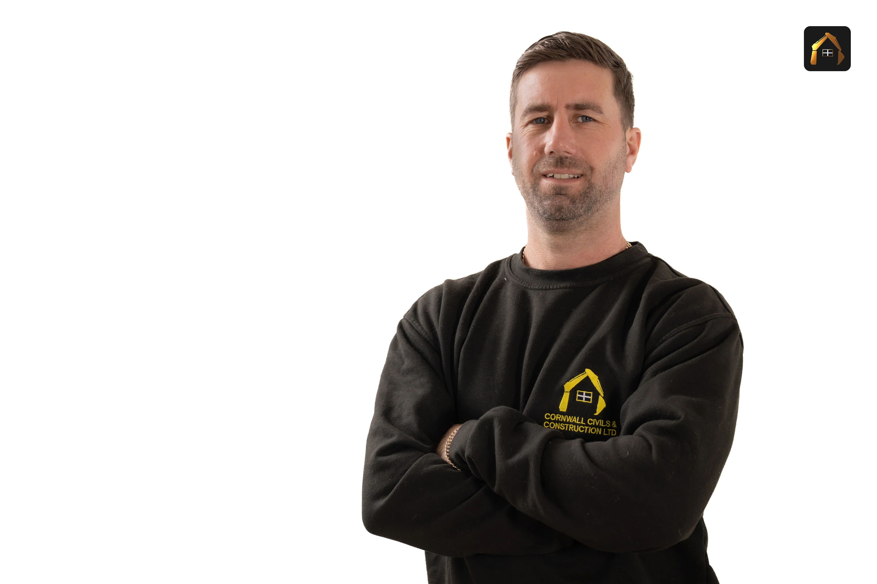 Matt Richards of Cornwall Civils & Construction in a branded sweatshirt with arms folded