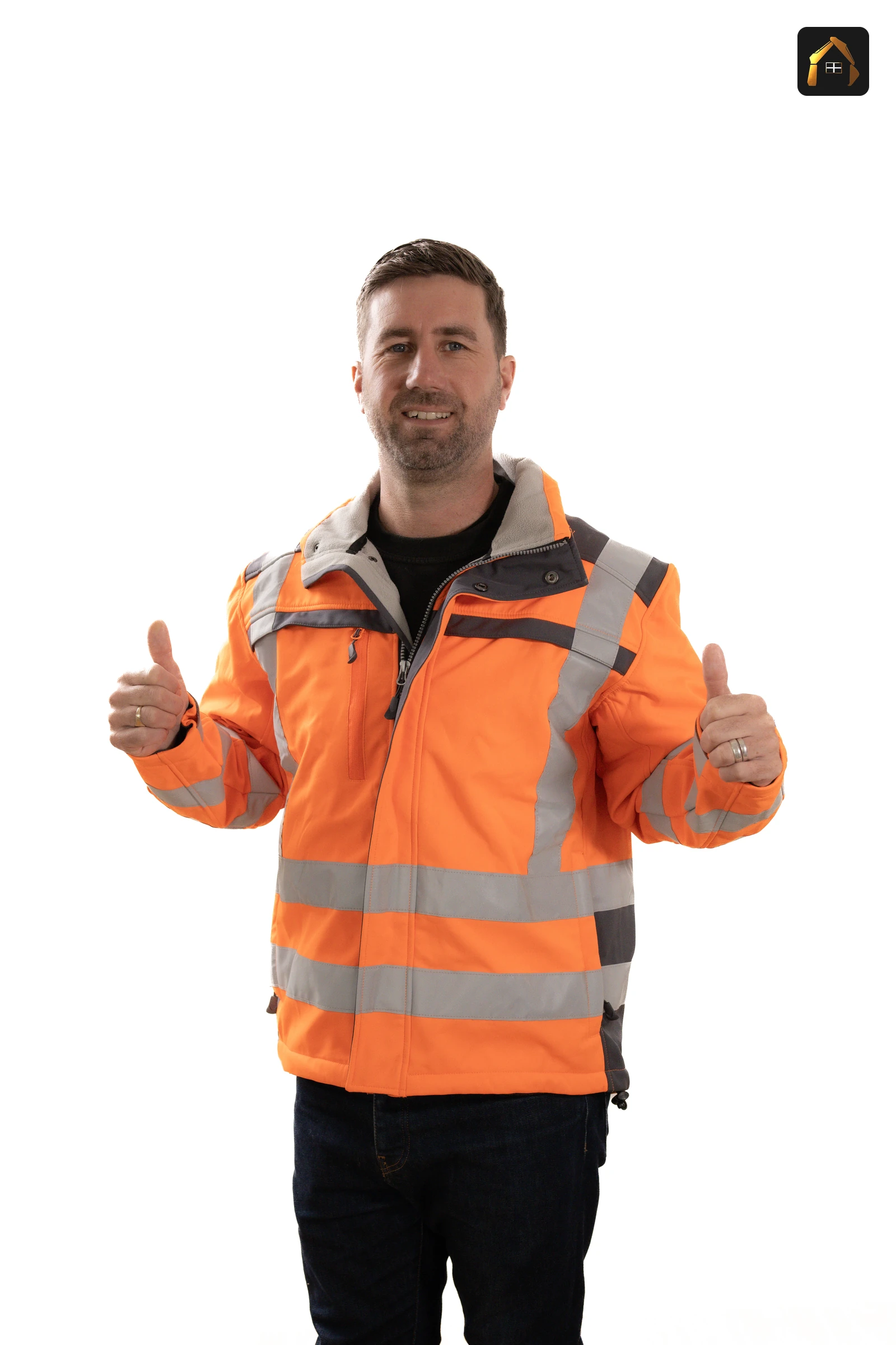 Matt Richards of Cornwall Civils & Construction in orange hi-vis giving a thumbs up