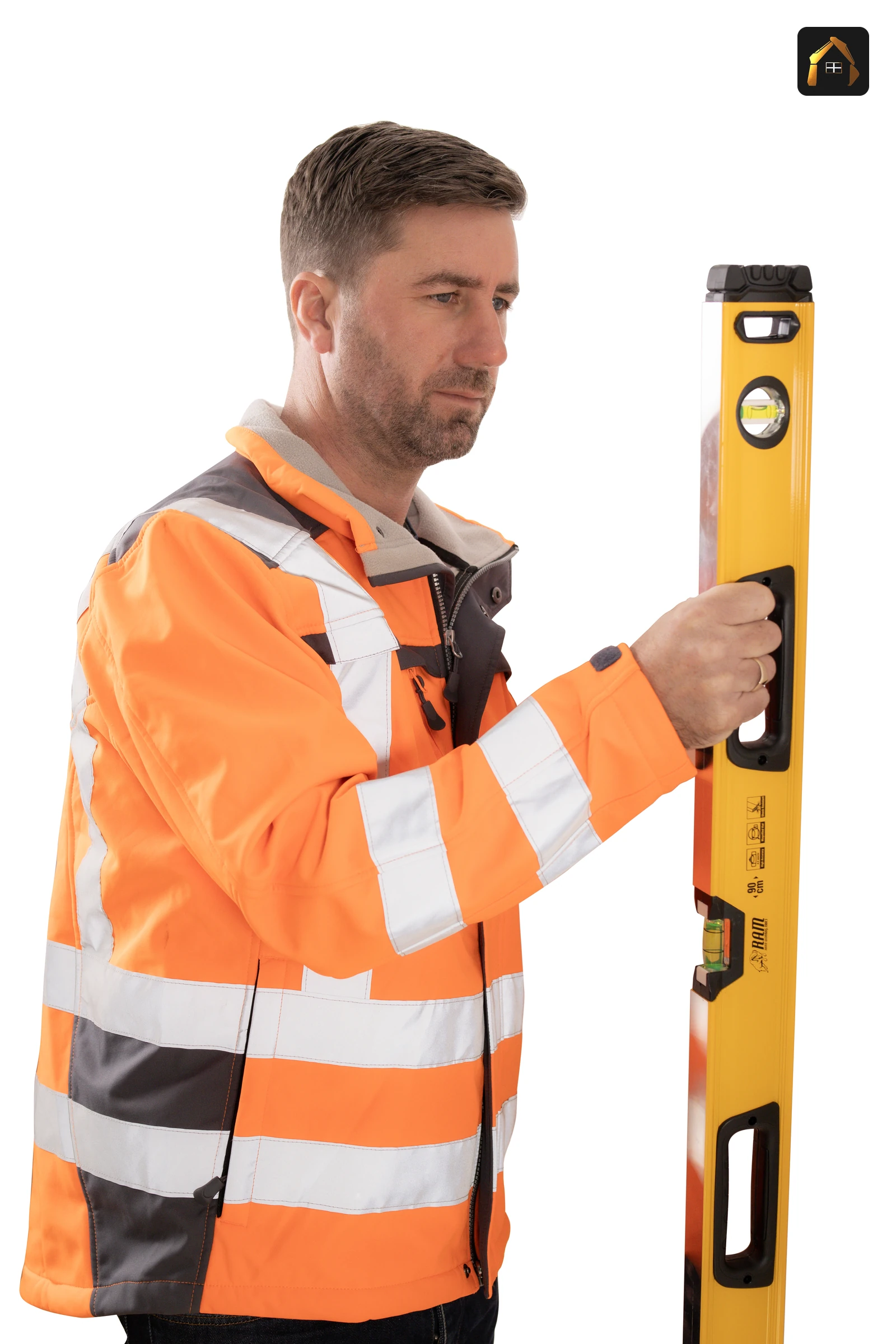 Matt Richards of Cornwall Civils & Construction holding a spirit level