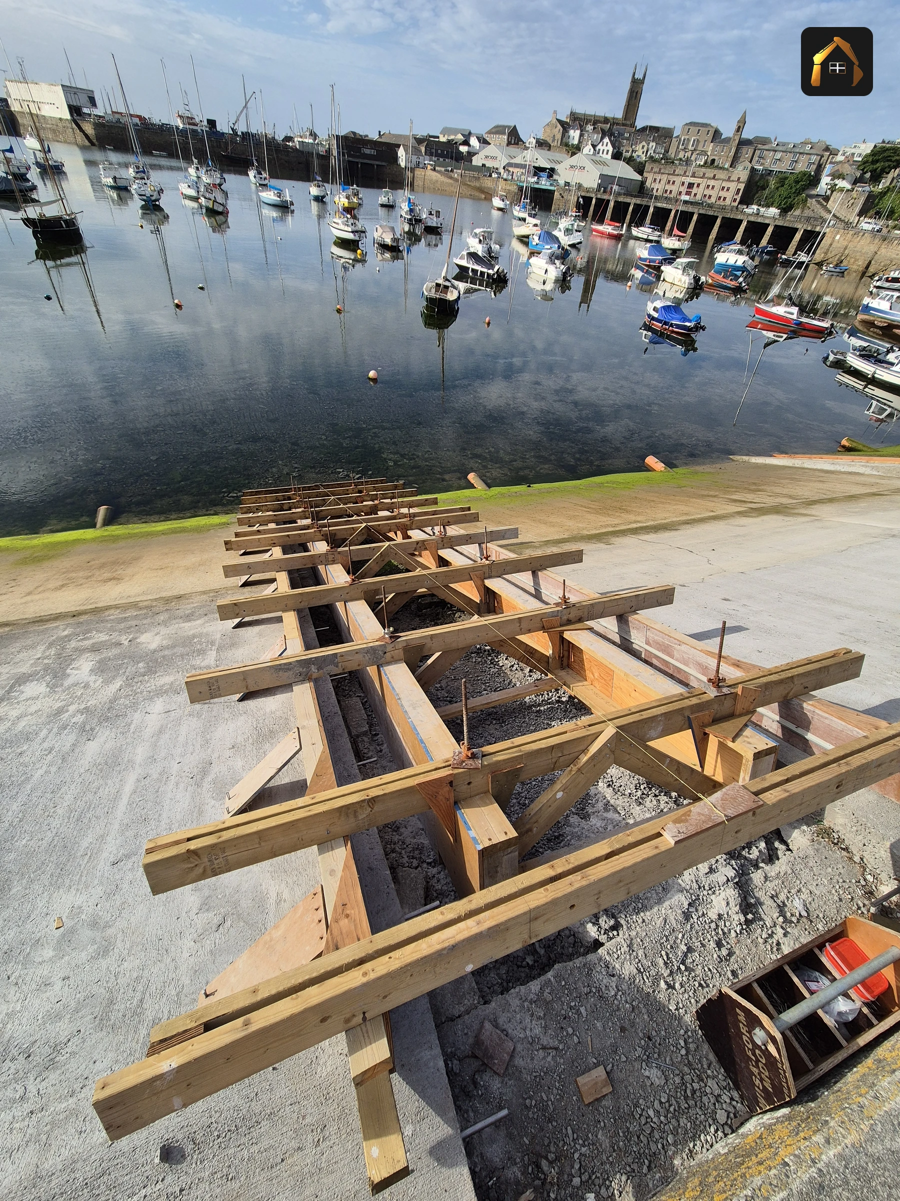 Stepped timber shuttering built across the harbour slipway in Penzance