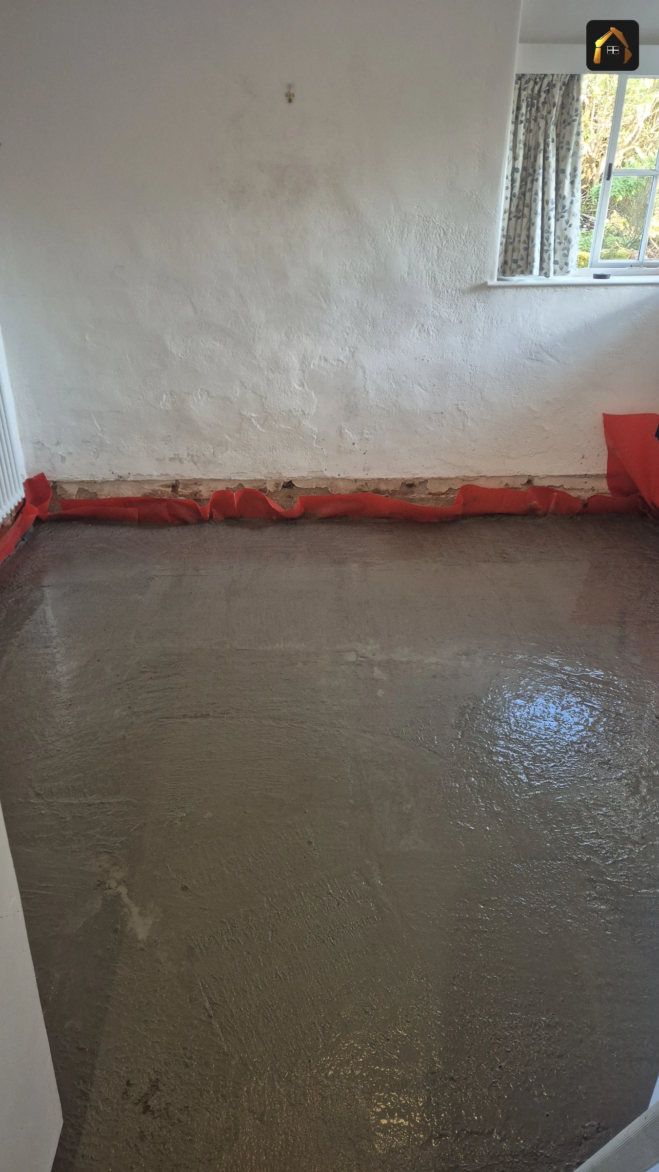 New concrete floor slab poured level with a wet finish in Sennen Cove