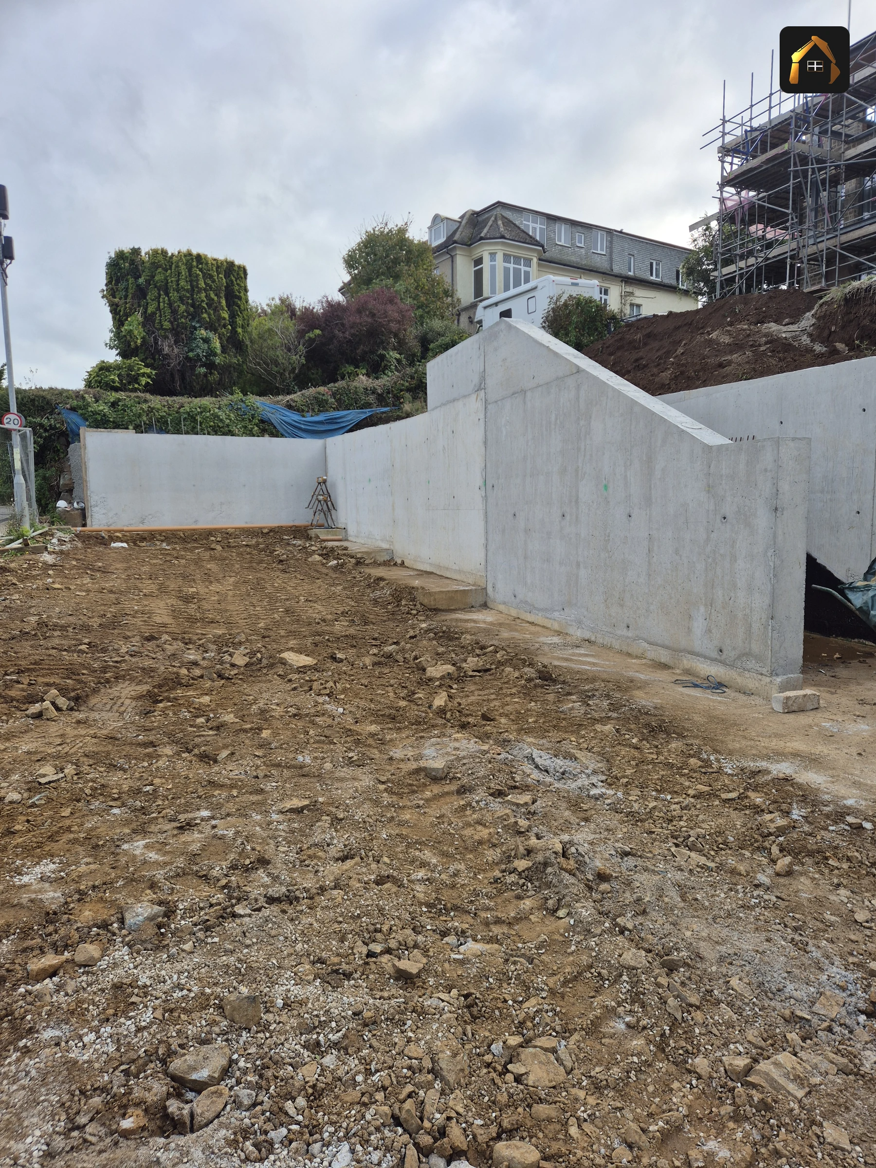 Completed stepped retaining wall along the full length of the plot at Carrick Lodge in St Ives