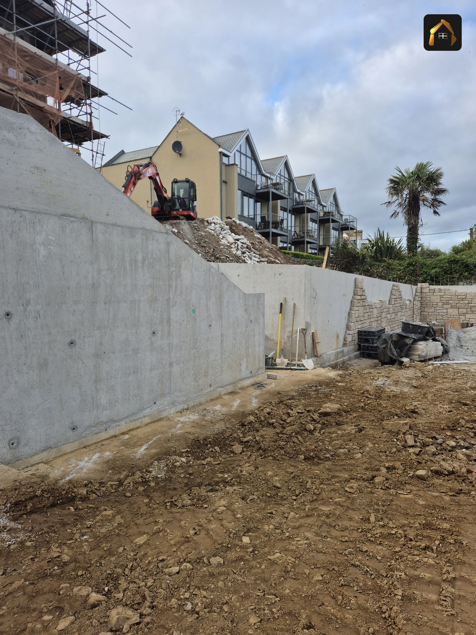 Completed stepped retaining wall with Carrick Lodge above in St Ives