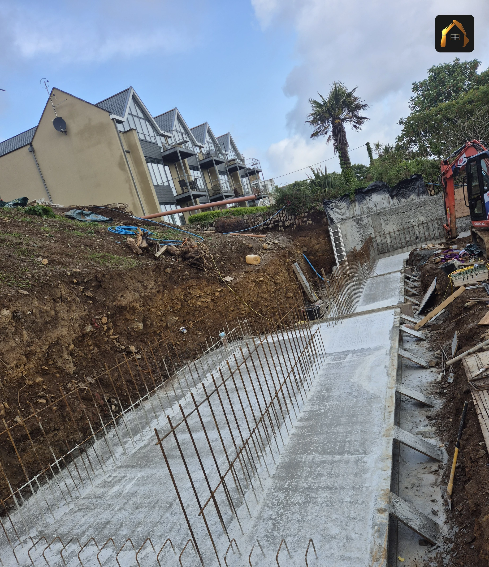 Reinforcement cage laid in the footing trench of the Carrick Lodge retaining wall in St Ives