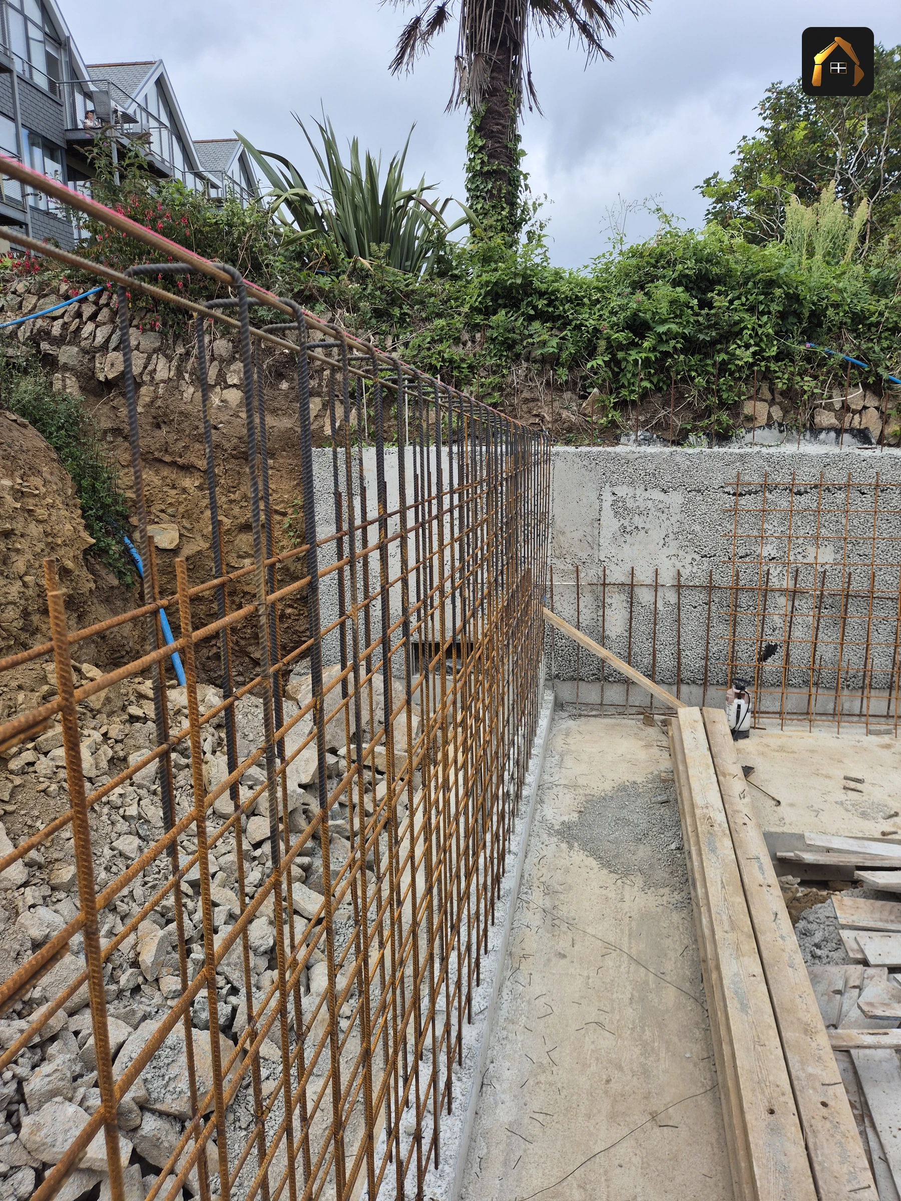 Reinforcement cage standing in a deep excavation for the Carrick Lodge retaining wall in St Ives